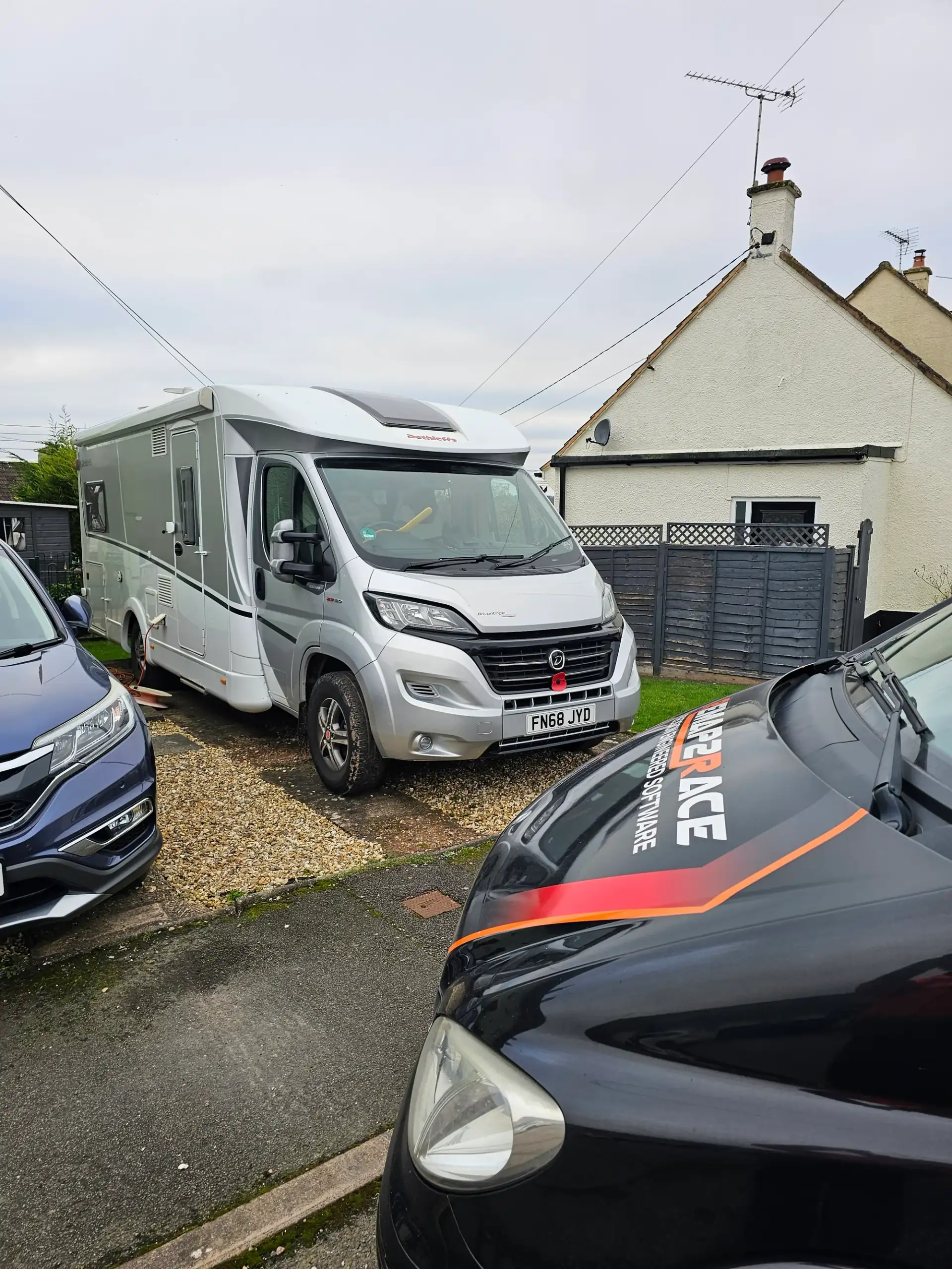 Dethleffs motorhome on the driveway with the Remap2Race van bonnet in the foreground